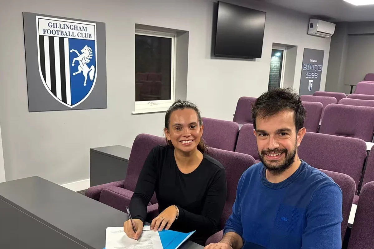 The sponsorship agreement being signed at Gillingham Football Club